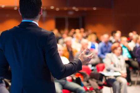 Speaker at Business Conference and Presentation. Audience at the conference hall.
